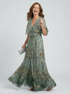 Halter Neck Floral Maxi Dress with Flowing Midi Length