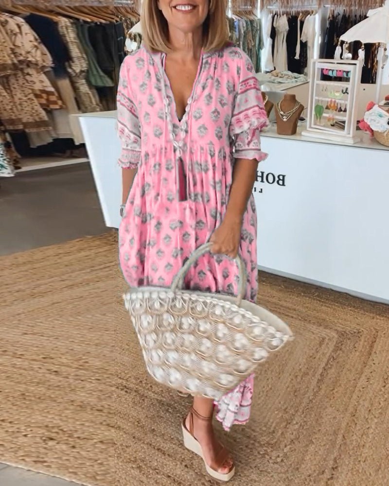 Chic Floral V-Neck Dress with Flattering Fit and Flowing Design