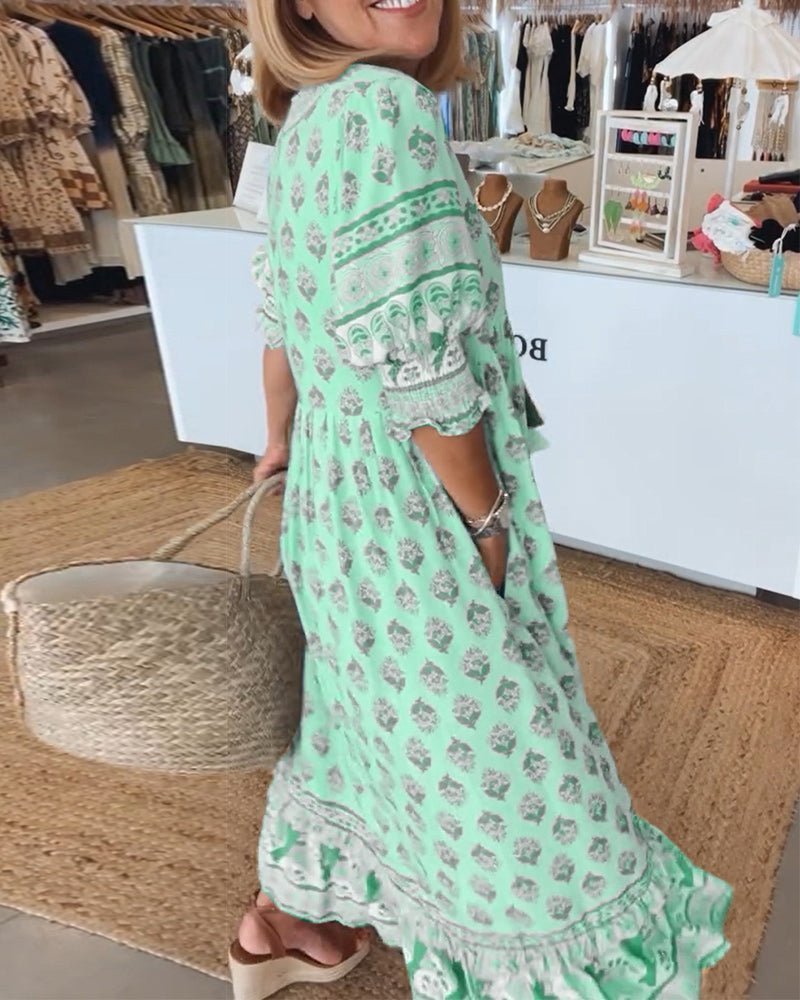 Chic Floral V-Neck Dress with Flattering Fit and Flowing Design