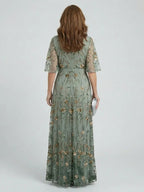 Halter Neck Floral Maxi Dress with Flowing Midi Length