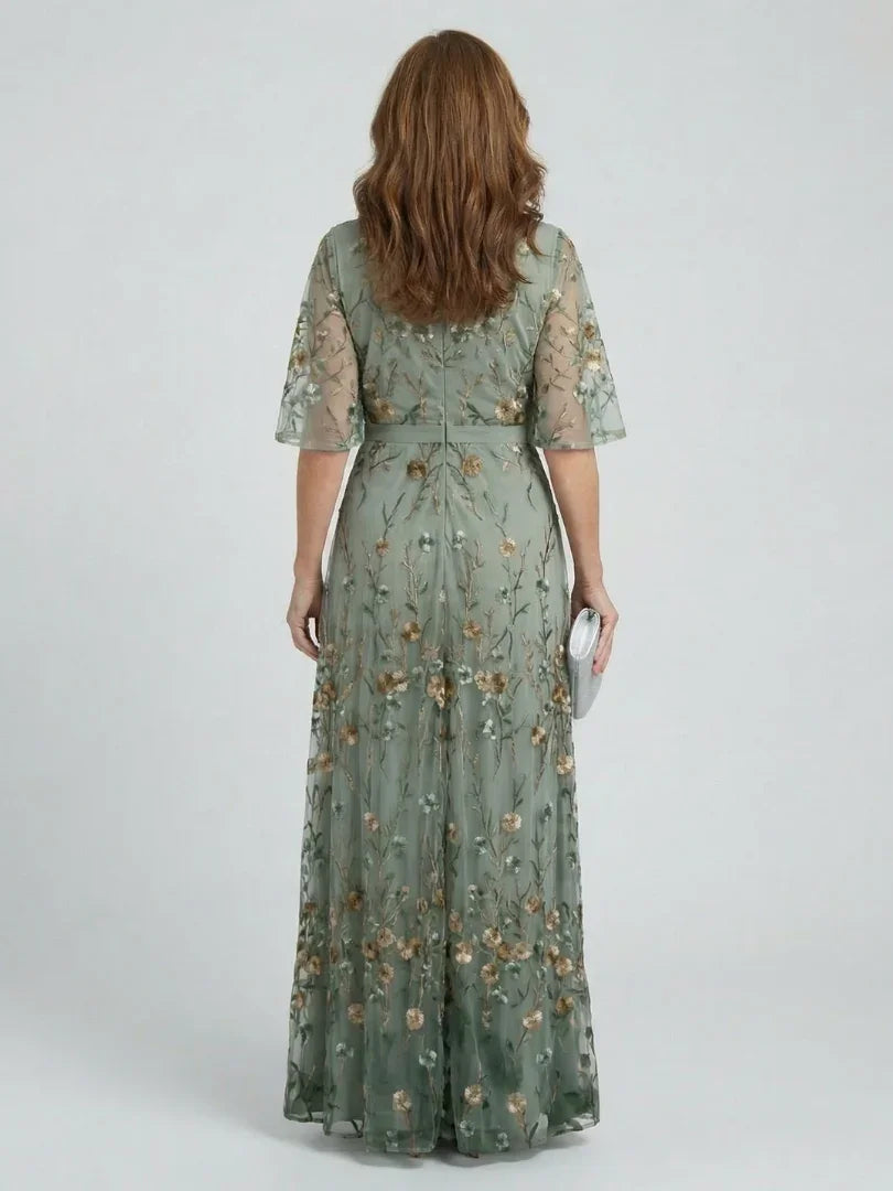 Halter Neck Floral Maxi Dress with Flowing Midi Length