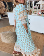 Chic Floral V-Neck Dress with Flattering Fit and Flowing Design