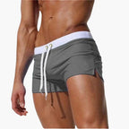 Men's Elastic Waist Swim Shorts with Adjustable Drawstring and Side Panels