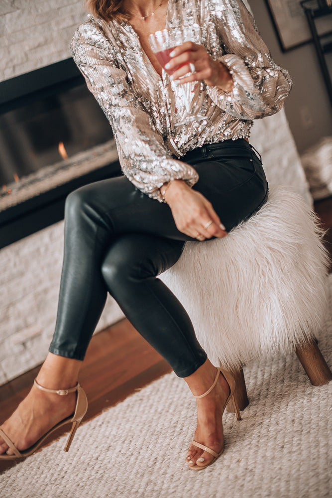 Glamorous V-neck women's blouse with sequins and long puff sleeves