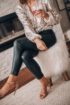 Glamorous V-neck women's blouse with sequins and long puff sleeves
