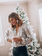Glamorous V-neck women's blouse with sequins and long puff sleeves