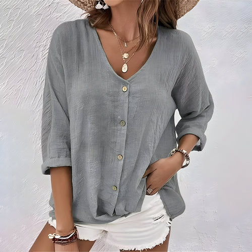 Effortless Linen Blouse with Deep V-Neck and Button Closure