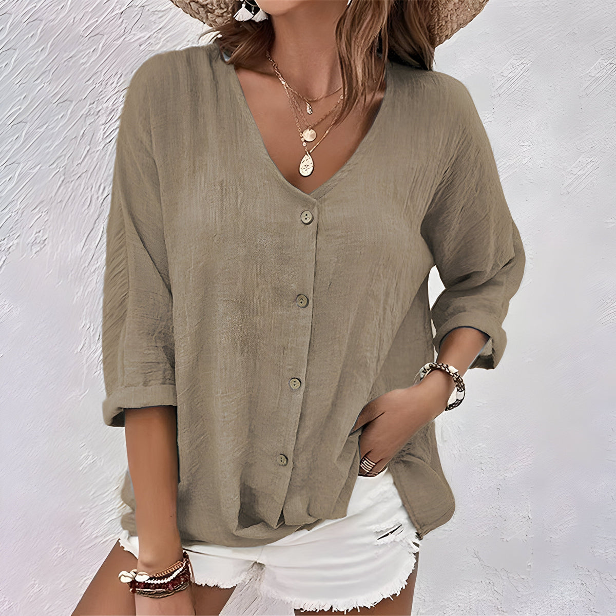 Effortless Linen Blouse with Deep V-Neck and Button Closure