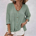 Effortless Linen Blouse with Deep V-Neck and Button Closure
