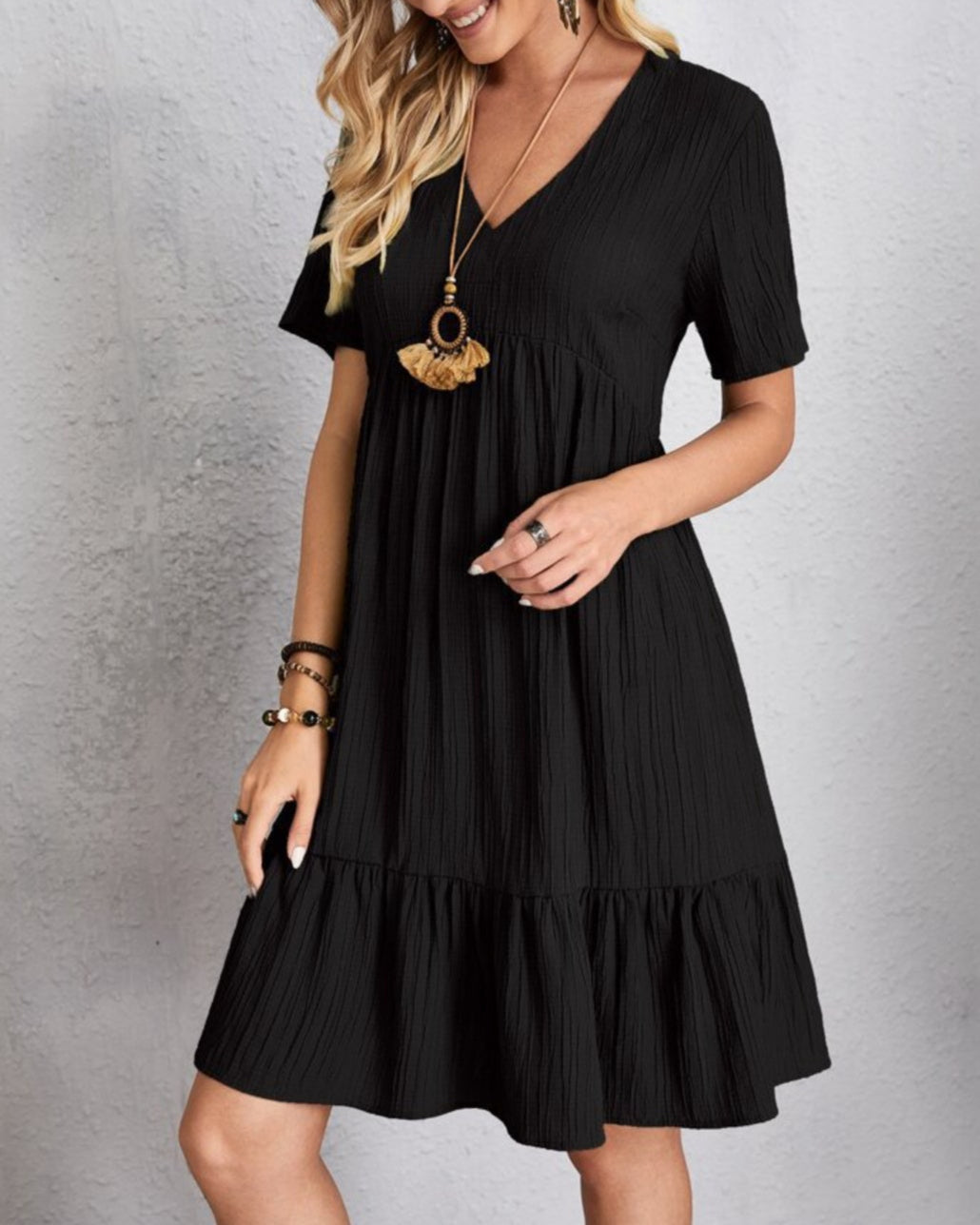 Women’s Mini Babydoll Dress with Deep V-Neck and Ruffled Hemline